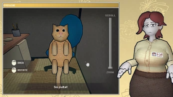 Ms. Happ inspecting a cat-shaped office object